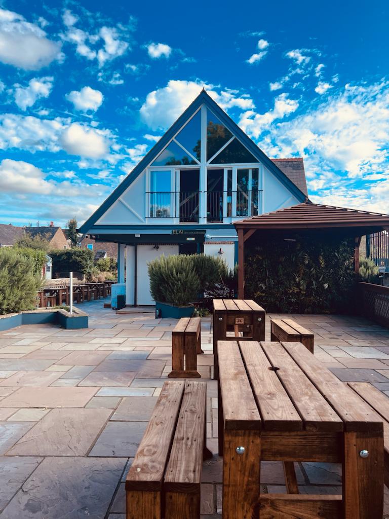 Outdoor seating area and front view of Elai restaurant Salisbury
